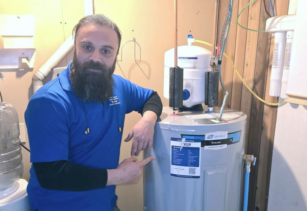 expert plumber providing tank and tankless water heater repair in Bradford