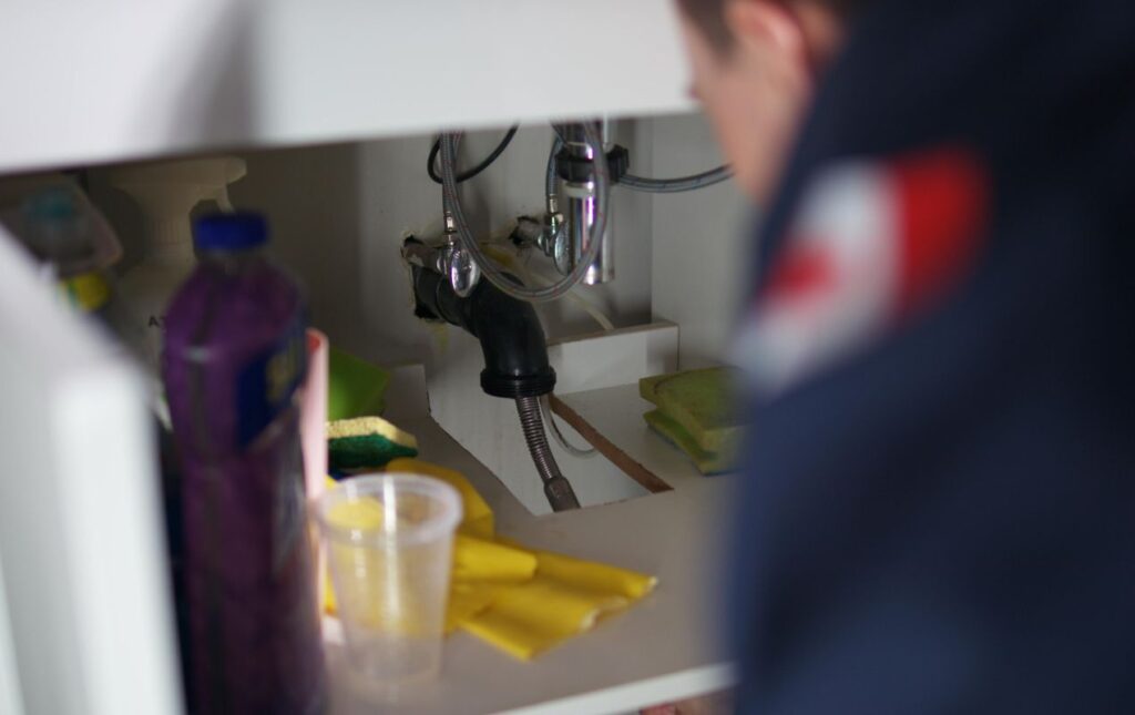 Superior Plumbing & Heating technician using a sewer camera for professional Drain Cleaning