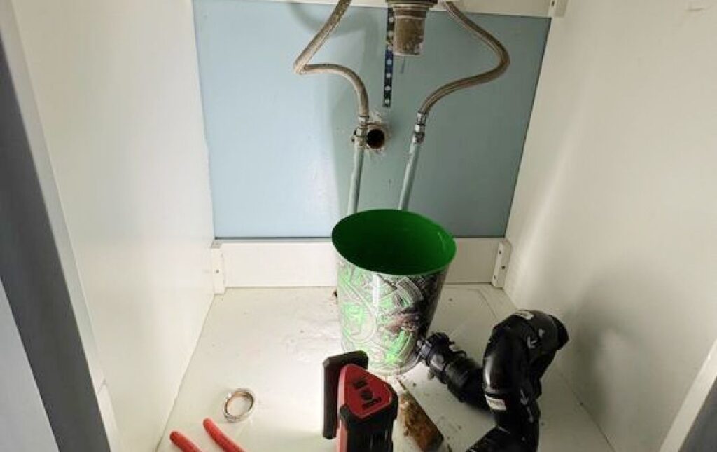 Under-sink plumbing preparation for Drain Cleaning local by the Superior Plumbing & Heating crew.