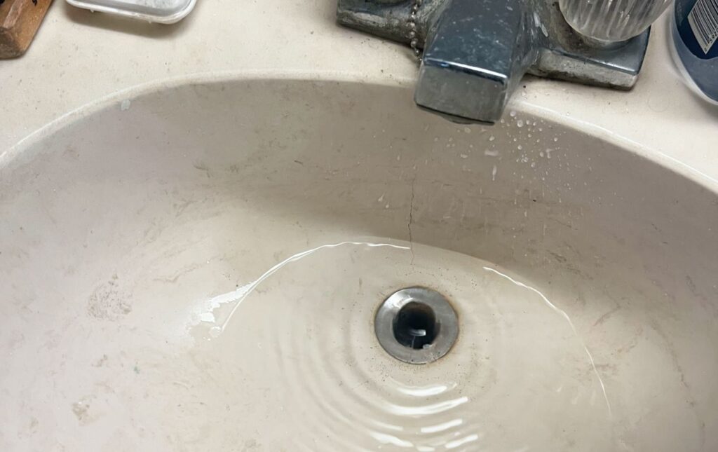 Clean bathroom sink water after professional Drain Cleaning local by Superior Plumbing & Heating.