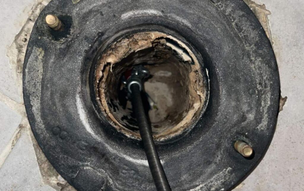 Internal view of a clogged pipe requiring Drain Cleaning local by Superior Plumbing & Heating.