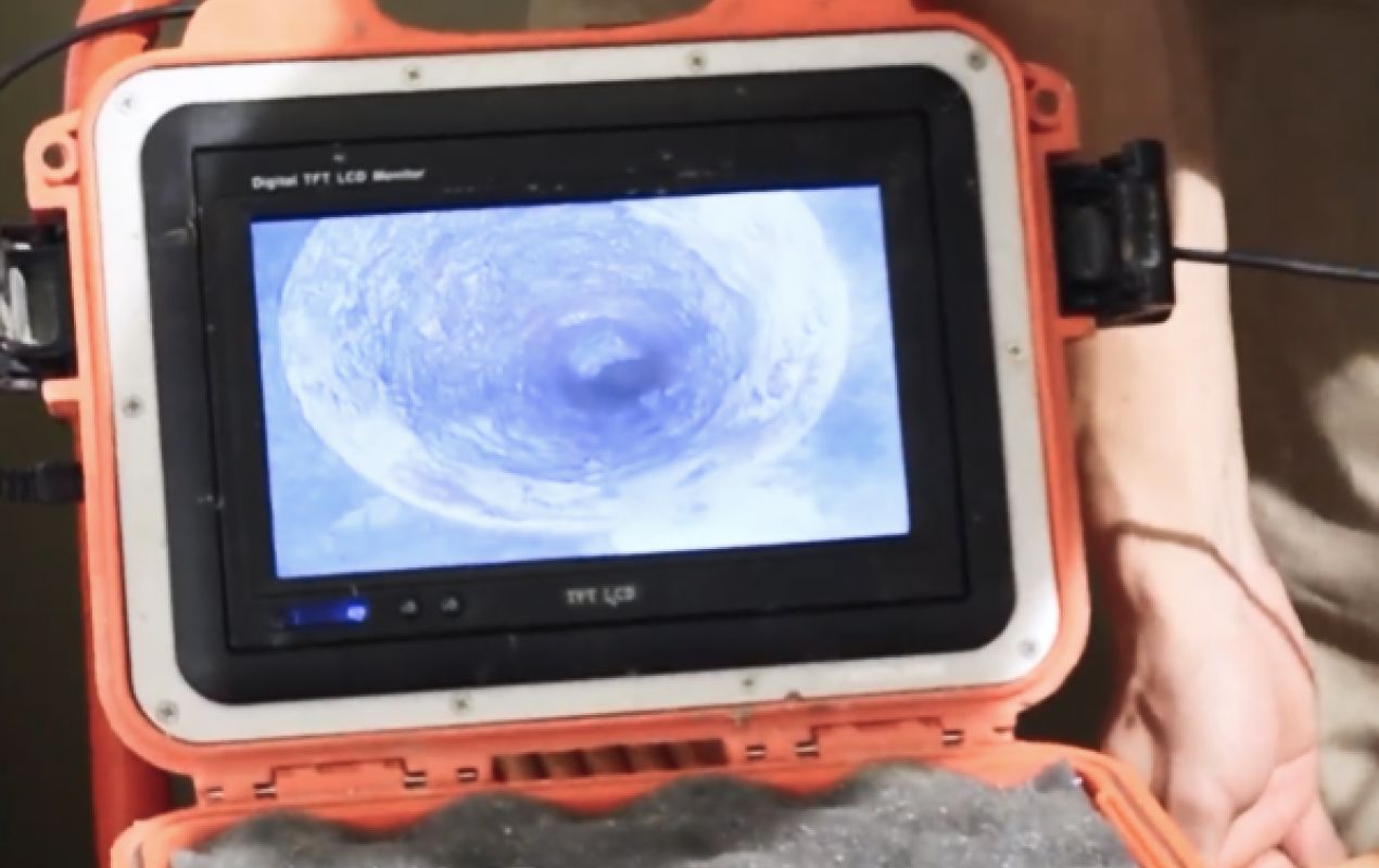 Sewer camera monitor showing pipe interior for Drain Cleaning local by Superior Plumbing & Heating.