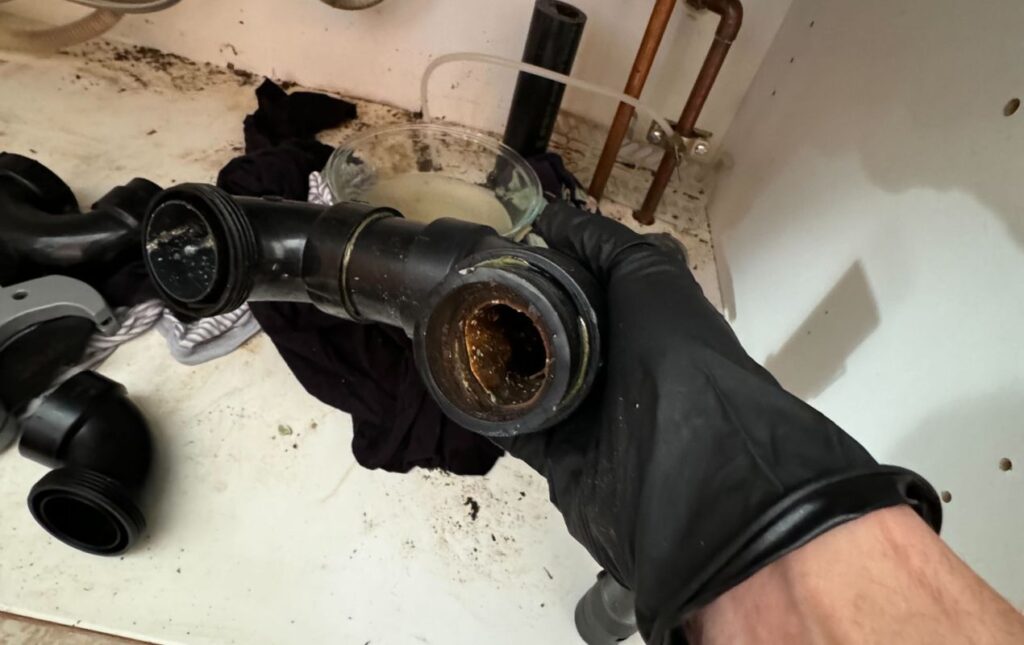 Clogged pipe debris found during Drain Cleaning local by Superior Plumbing & Heating experts.