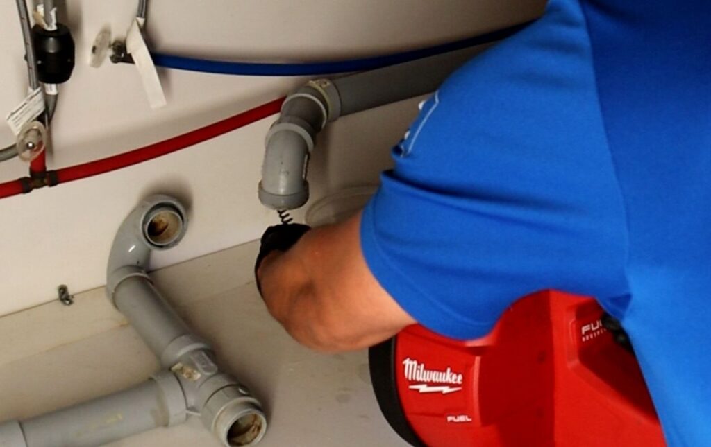 Red power tool used for Drain Cleaning local by Superior Plumbing & Heating professional.