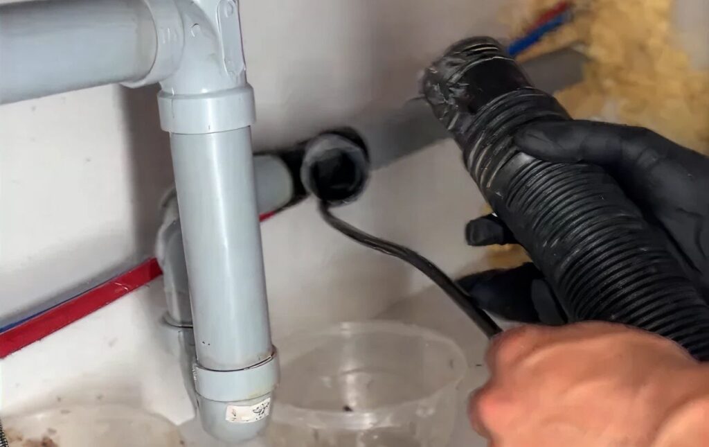 Detailed view of drain piping for Drain Cleaning local by Superior Plumbing & Heating.