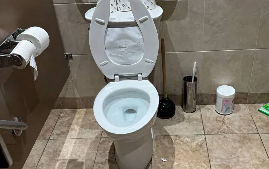 Completed toilet repair service by Superior Plumbing & Heating, ensuring proper flush performance and clean bathroom use