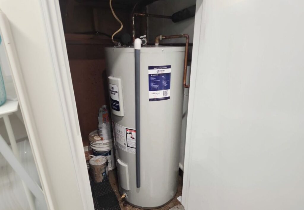 Superior Plumbing & Heating professional Water Heater Installation of a Bradford White tank in a residential closet
