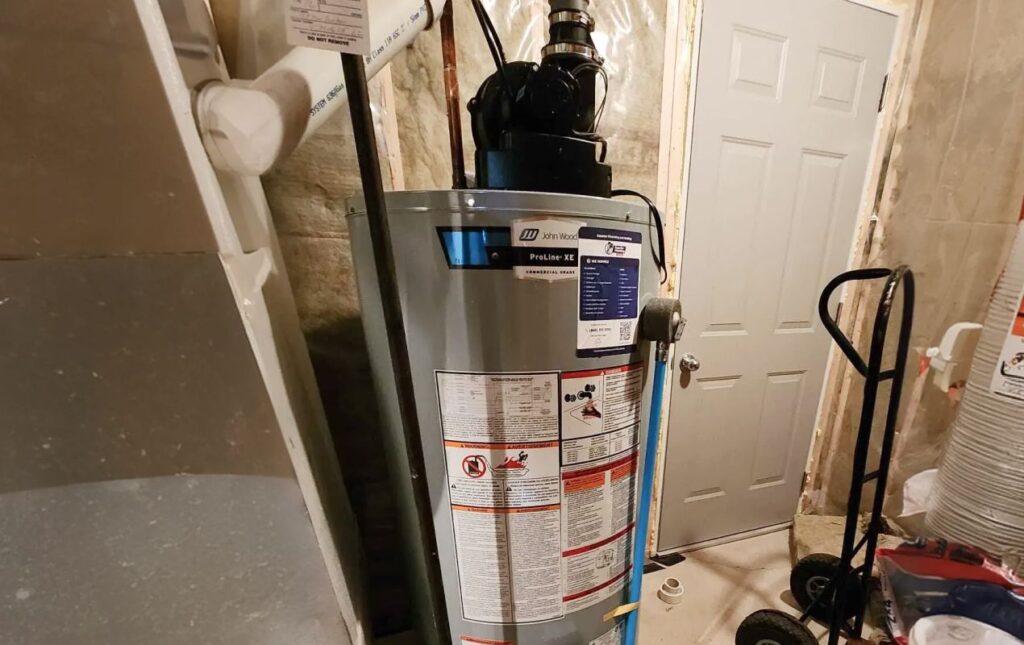 Superior Plumbing & Heating expert Water Heater Installation of a John Wood ProLine XE gas tank in a home basement