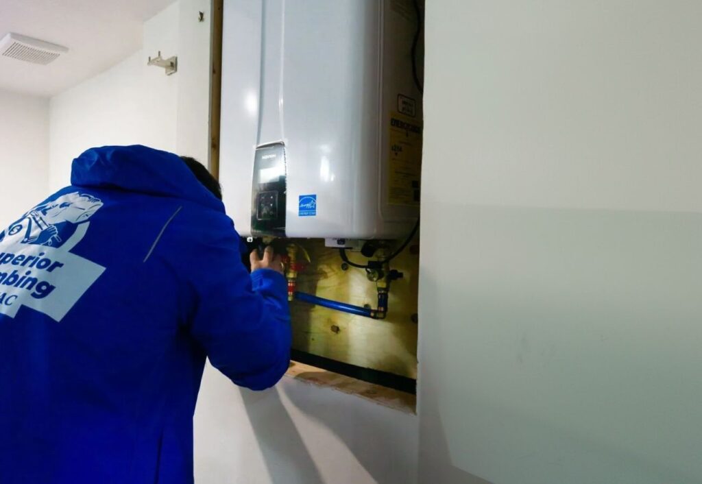 Superior Plumbing & Heating expert Water Heater Repair and maintenance of a Navien high-efficiency tankless system