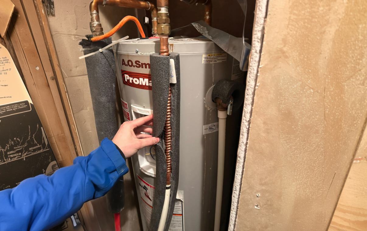 Superior Plumbing & Heating expert Water Heater Repair of an A.O. Smith ProMax tank with copper pipe inspection