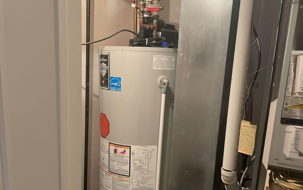Superior Plumbing & Heating professional Water Heater Installation of a Bradford White tank unit in a residential basement