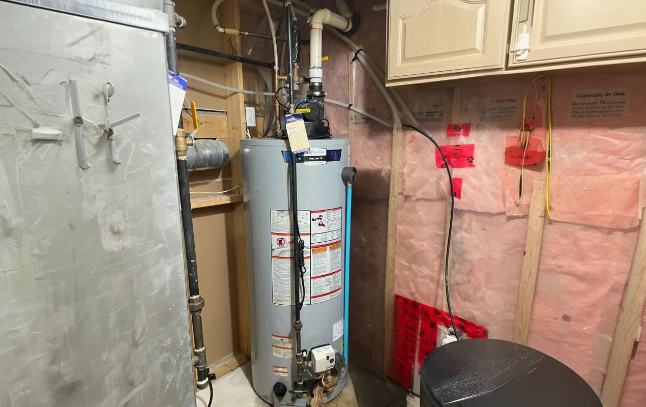 Superior Plumbing & Heating professional Water Heater Installation of a John Wood ProLine XE tank in a basement