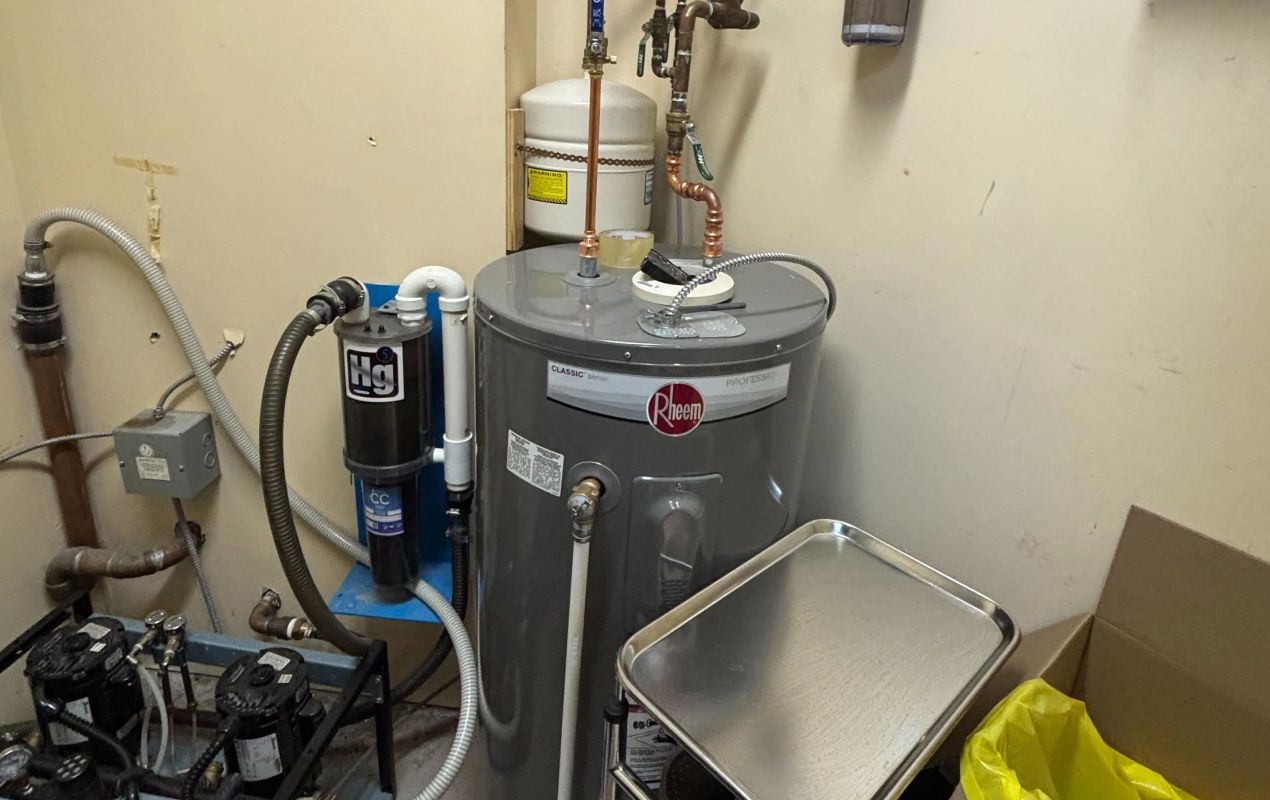 Superior Plumbing & Heating professional Water Heater Installation of a Rheem Classic tank unit in a utility room