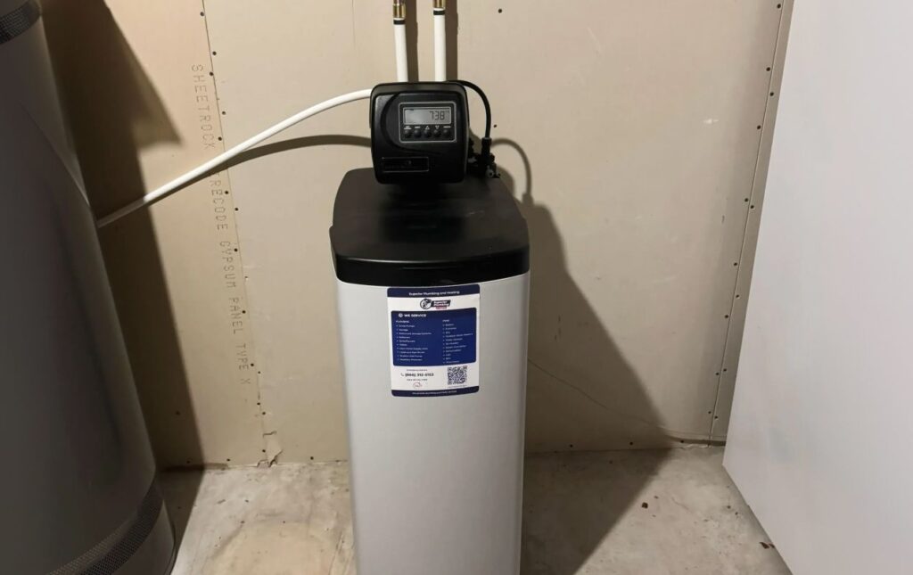 Superior Plumbing & Heating expert Water Softener Installation of a grey cabinet-style unit with a digital control valve