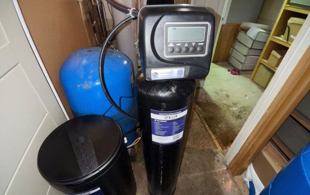 Superior Plumbing & Heating expert Water Softener Replacement of a two-tank system with a blue pressure vessel