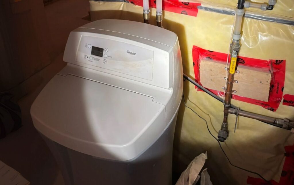 Superior Plumbing & Heating expert Water Softener Repair of a white residential cabinet-style water softening unit