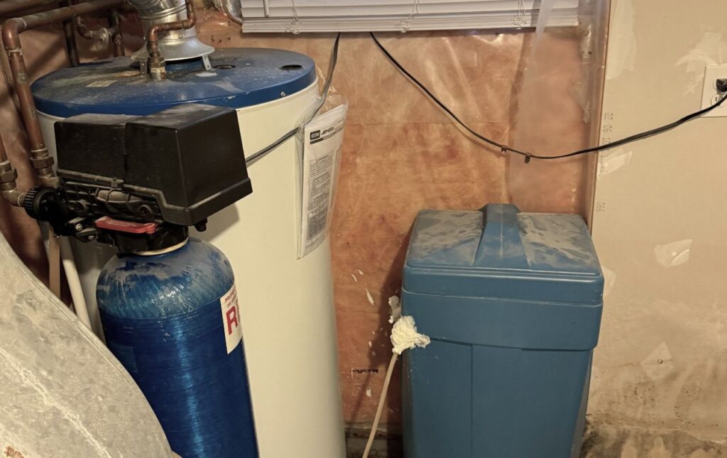 Superior Plumbing & Heating expert Water Softener Repair of blue media tanks and a blue cabinet-style system