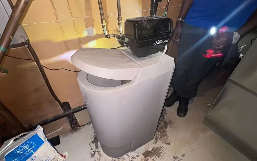 Superior Plumbing & Heating expert Water Softener Repair of a grey residential cabinet-style water softening unit