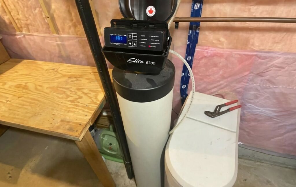 Superior Plumbing & Heating expert Water Softener Repair of a white resin tank with an Elite series digital control valve