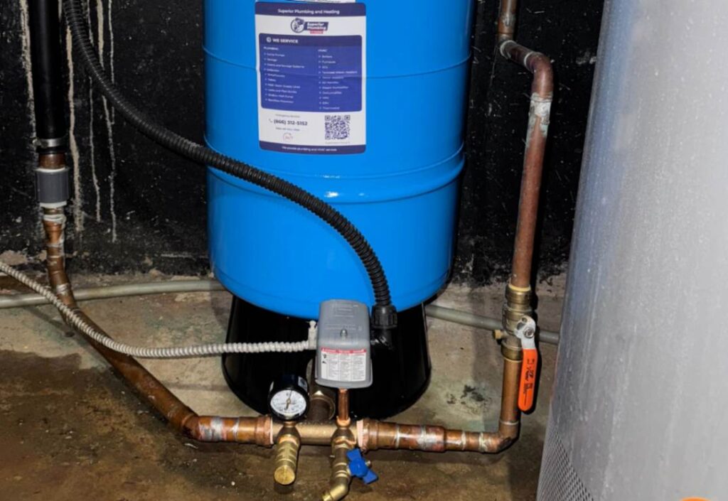 Tank piping setup for well pump installation local by Superior Plumbing & Heating.