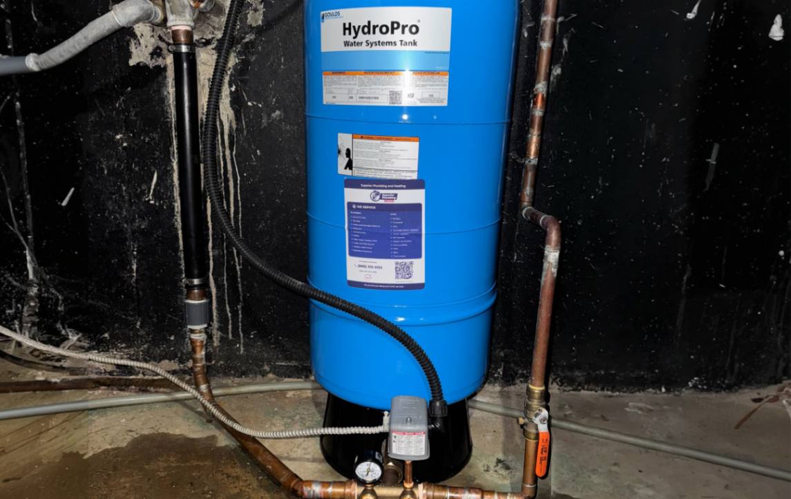 Vertical HydroPro pressure tank installed and ready for a well pump installation local by Superior Plumbing & Heating