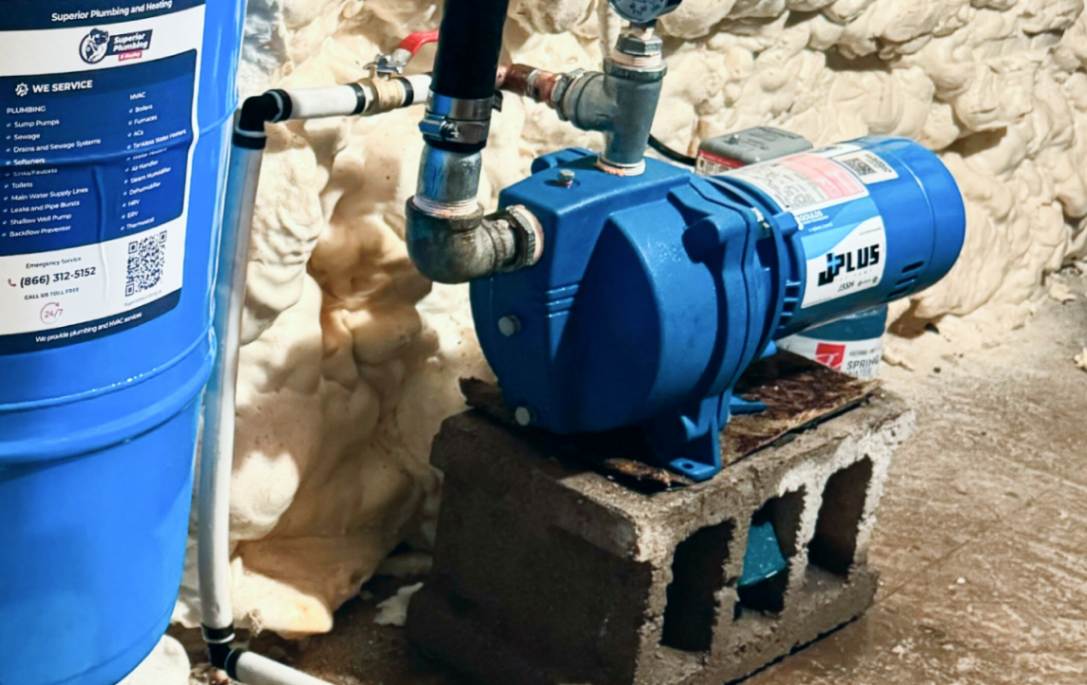 Heavy-duty jet pump mounted on a block base for a well pump installation local by Superior Plumbing & Heating