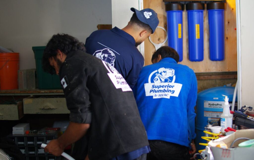 Team planning a well pump replacement local service by Superior Plumbing & Heating.