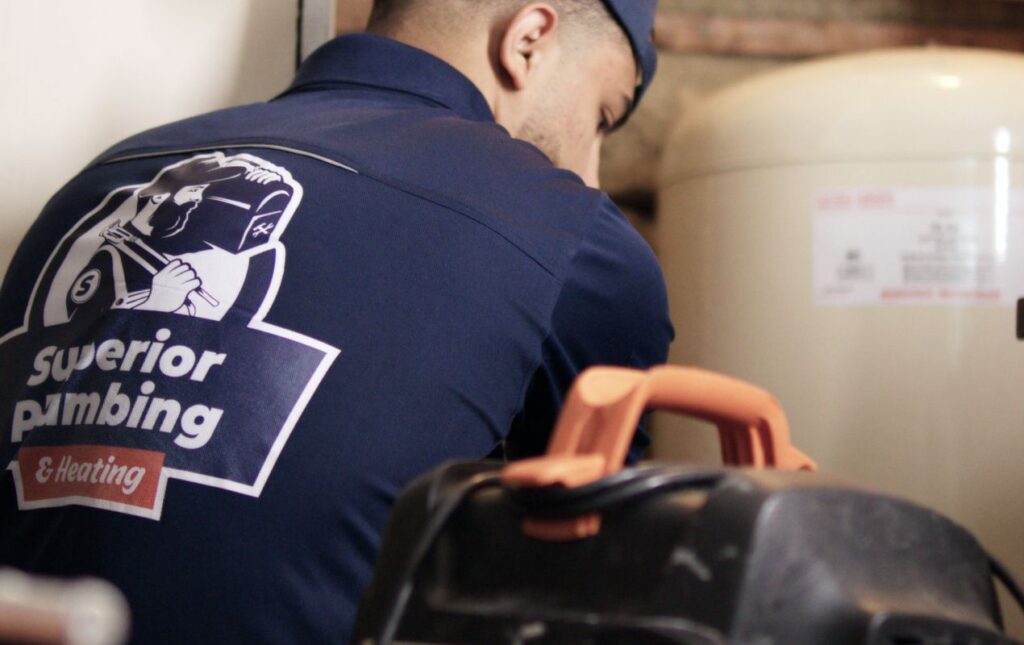 Licensed specialist performing Well pump repair local by Superior Plumbing & Heating.