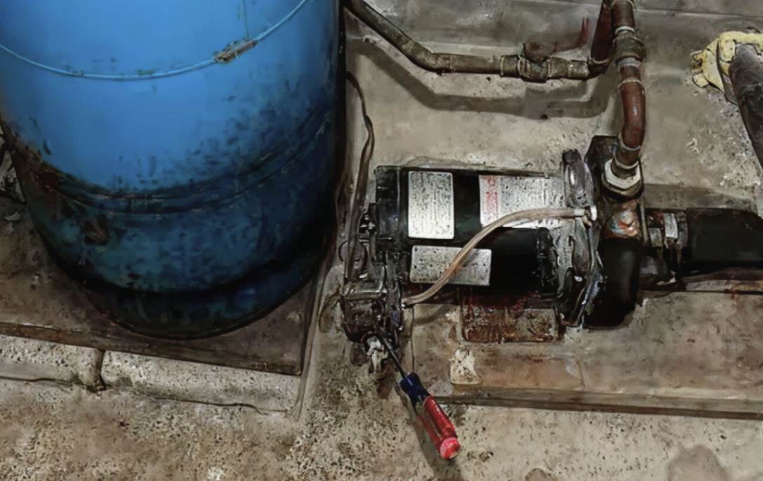 Rusty tank inspection for Well pump repair local by Superior Plumbing & Heating.