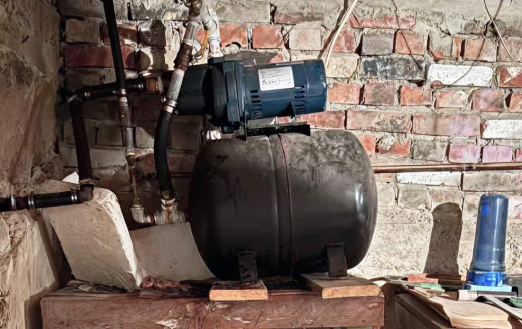 Jet pump on black tank for Well pump repair local by Superior Plumbing & Heating.