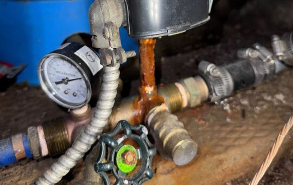 Pressure gauge and valve check for well pump repair local by Superior Plumbing & Heating.