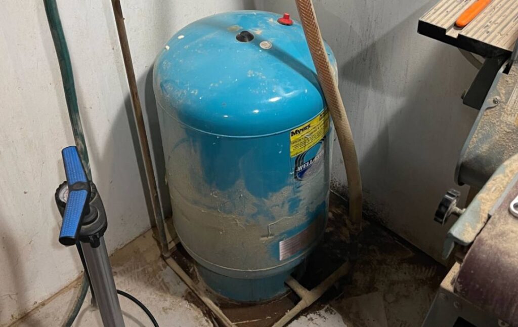 Vertical pressure tank for Well pump repair local by Superior Plumbing & Heating.