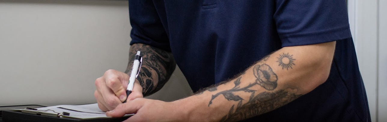 likely a plumber or HVAC specialist focused on his work