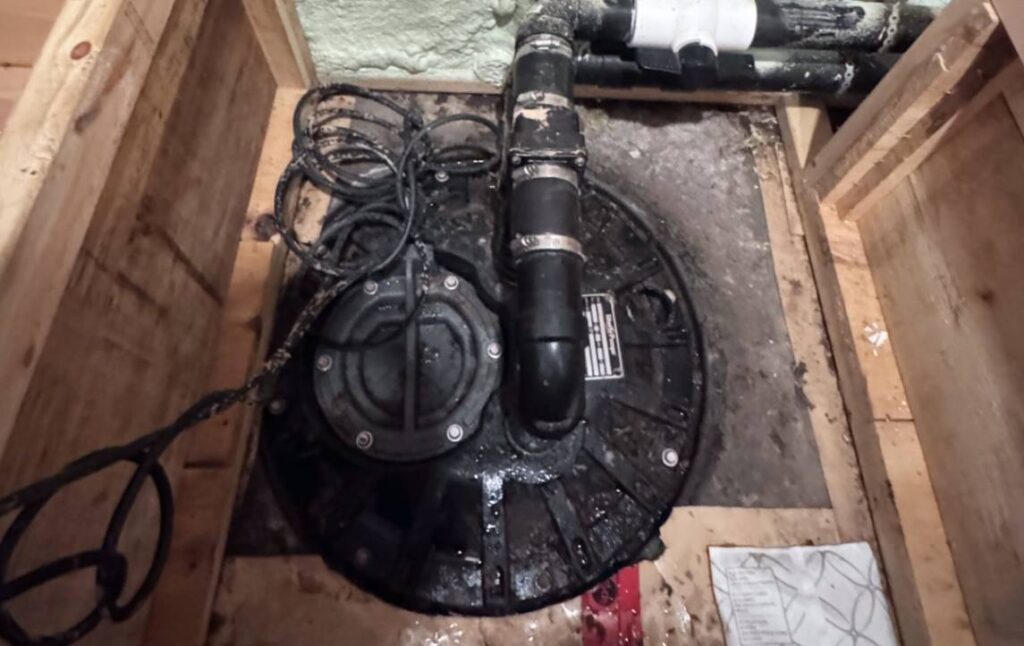 Professional black sealed basin lid after sump-pump-replacement local by Superior Plumbing & Heating.