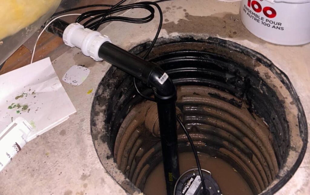Interior view of a corrugated basin during sump pump repair local by Superior Plumbing & Heating.