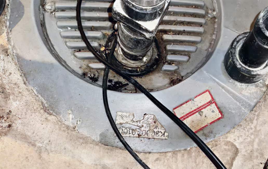 Close-up of electrical pump components for a sump pump repair local by Superior Plumbing & Heating.