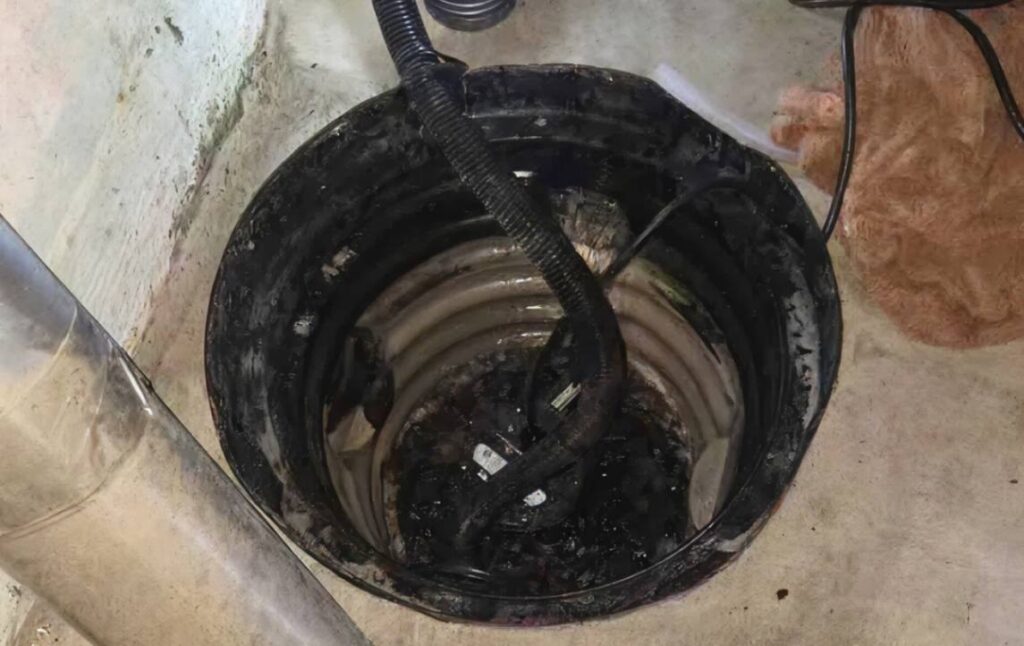 Adjusting the basin lid for a residential sump pump repair local by Superior Plumbing & Heating.