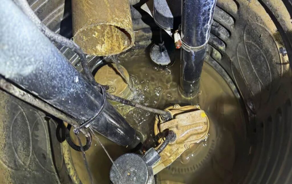 Dual pump configuration check for a sump pump repair local project by Superior Plumbing & Heating.