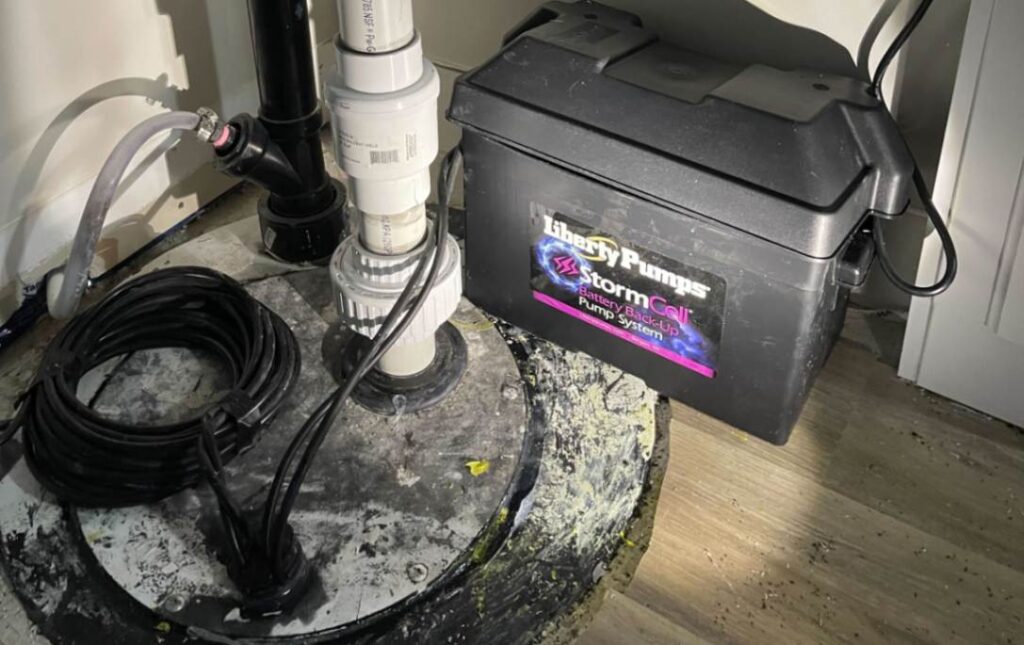 Superior Plumbing & Heating installing a backup battery system for sump pump repair local.