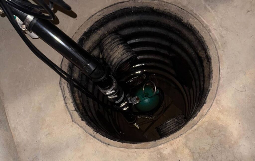 Interior view of a corrugated basin during Sump pump installation local by Superior Plumbing & Heating.