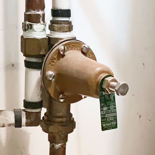 A Failing Pressure Reducing Valve (PRV)